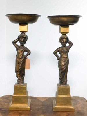 Antica coppia di statue cariatidi in ghisa trasformati in portavasi