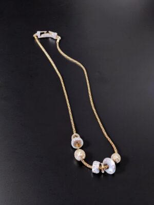 Collana vintage Swarovski con charm e cristalli