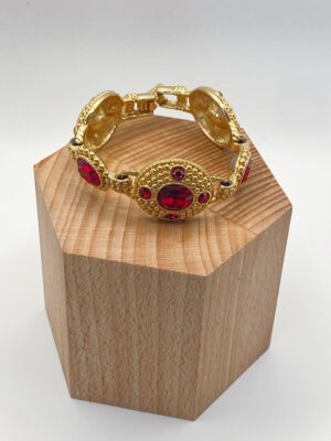 Parure vintage Swarovski con cristalli rosso rubino e finitura dorata