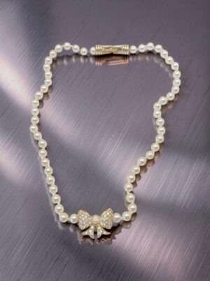 Collana Swarovski con perle e pendente a fiocco