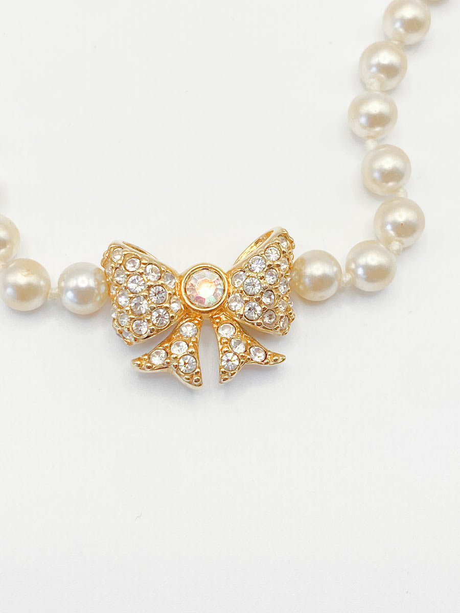 Collana Swarovski con perle e pendente a fiocco - immagine 2