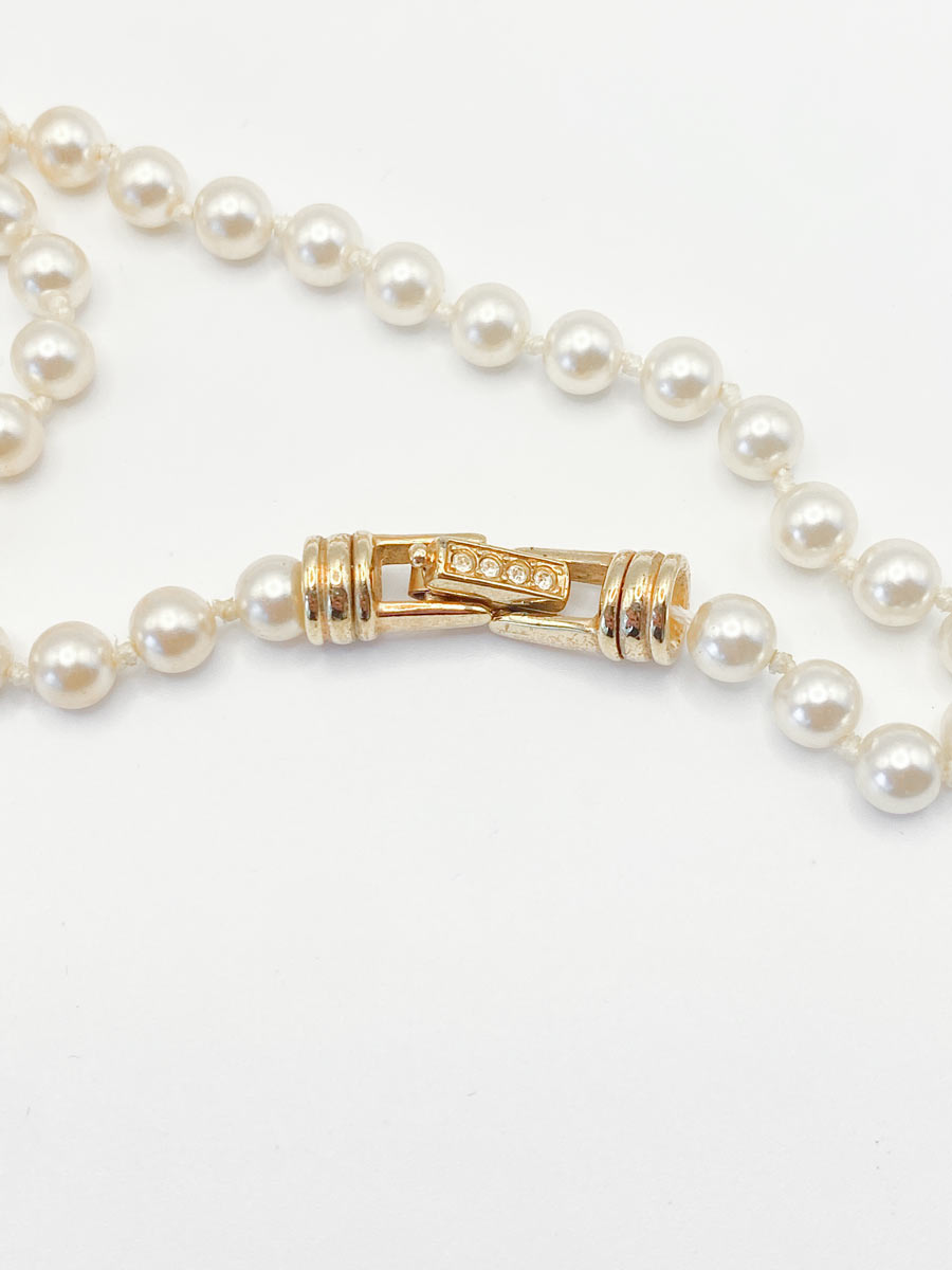 Collana Swarovski con perle e pendente a fiocco - immagine 4