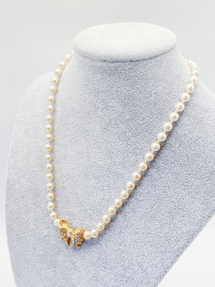 Collana Swarovski con perle e pendente a fiocco - immagine 6